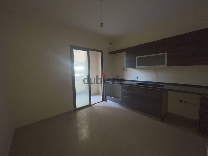RWK176JS - Apartment For Sale in Ballouneh - شقة للبيع في بلونة 3