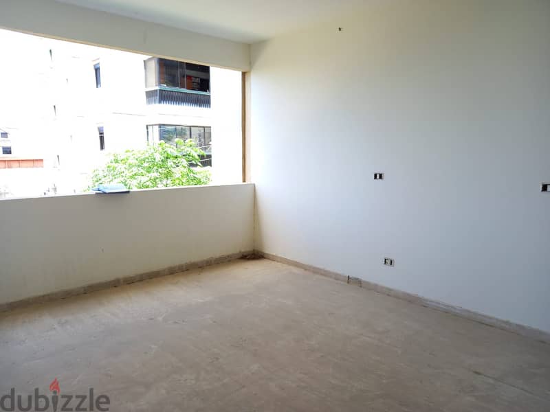 L08162 - Apartment for Sale in Haret Sakher with a Small Terrace 1