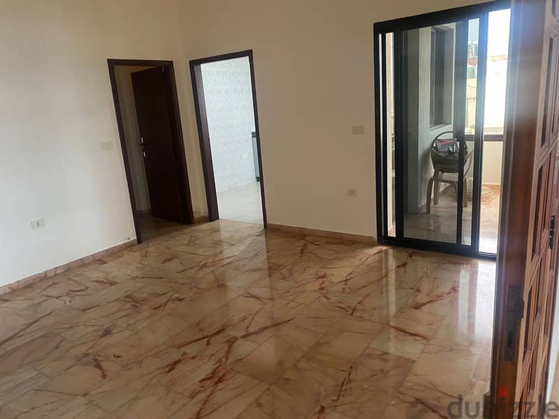 A 140 m2 apartment having an open view for rent in Dbaye 1