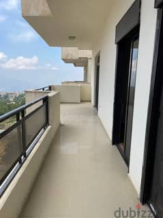 A 120 m2 apartment having an open mountain view for sale in Qlayaat
