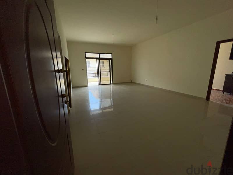 A 120 m2 apartment having an open mountain view for sale in Qlayaat 2