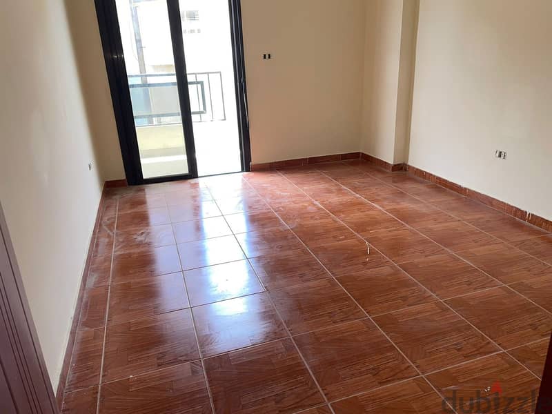 A 120 m2 apartment having an open mountain view for sale in Qlayaat 3