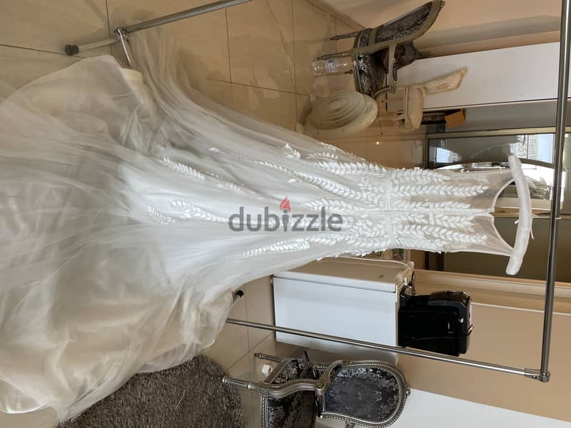 Liquidation! 35 Brand wedding dresses in bulk. تصفية! 5