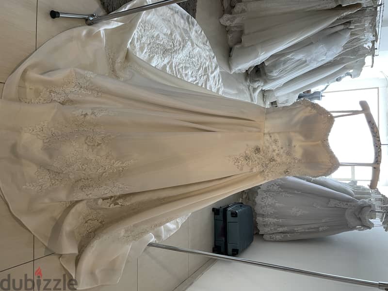 Liquidation! 35 Brand wedding dresses in bulk. تصفية! 6