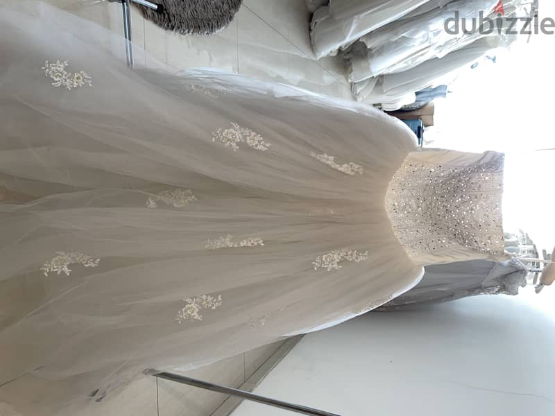 Liquidation! 35 Brand wedding dresses in bulk. تصفية! 10