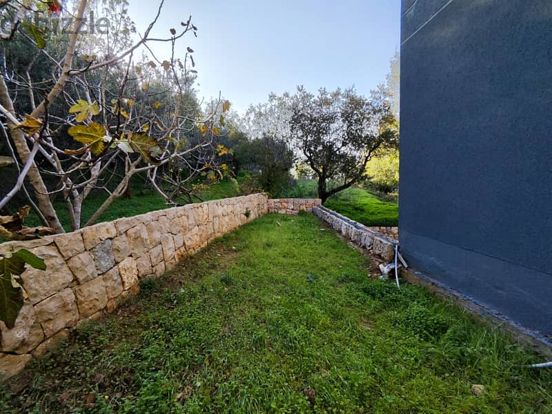 Qortada | Brand New 2 Bedrooms Apart with a Garden | Title Deed 8