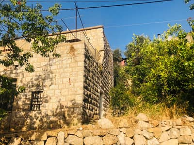 1480 m2 land  + old house for sale in Kornet Chehwen (Main Road)