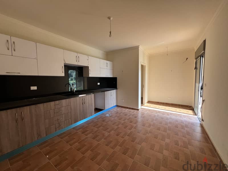 Apartment for sale in Haret Sakher شقة للبيع في حارة صخر 1