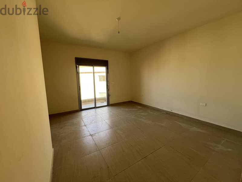 Apartment for sale in Haret Sakher شقة للبيع في حارة صخر 4