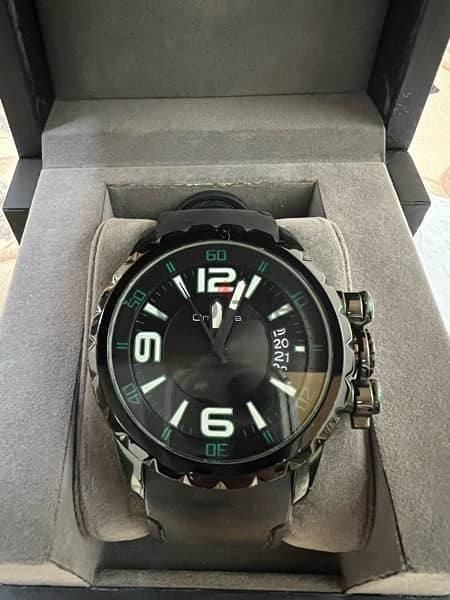 Black and Green Watch / ساعة سوداء و زيتية 0