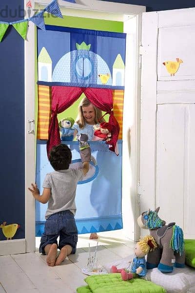 german store HUBA doorway puppet theater