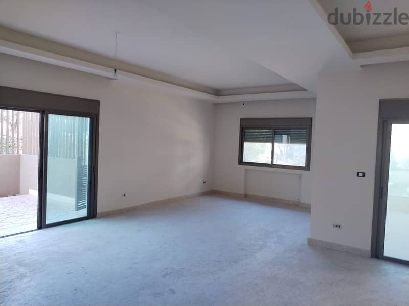 Deluxe  Decorated 200m2 apartment+107m2 terrace for sale in Mansourieh 1