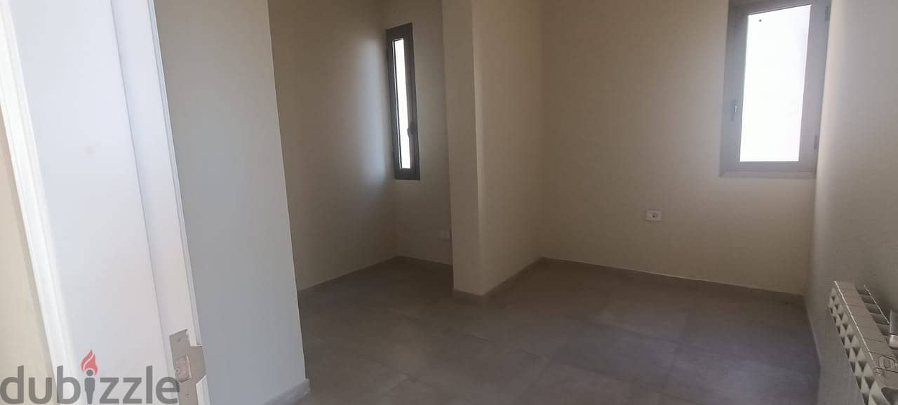 kfarhbab duplex with 100m terrace prime location near highway Ref#5879 2