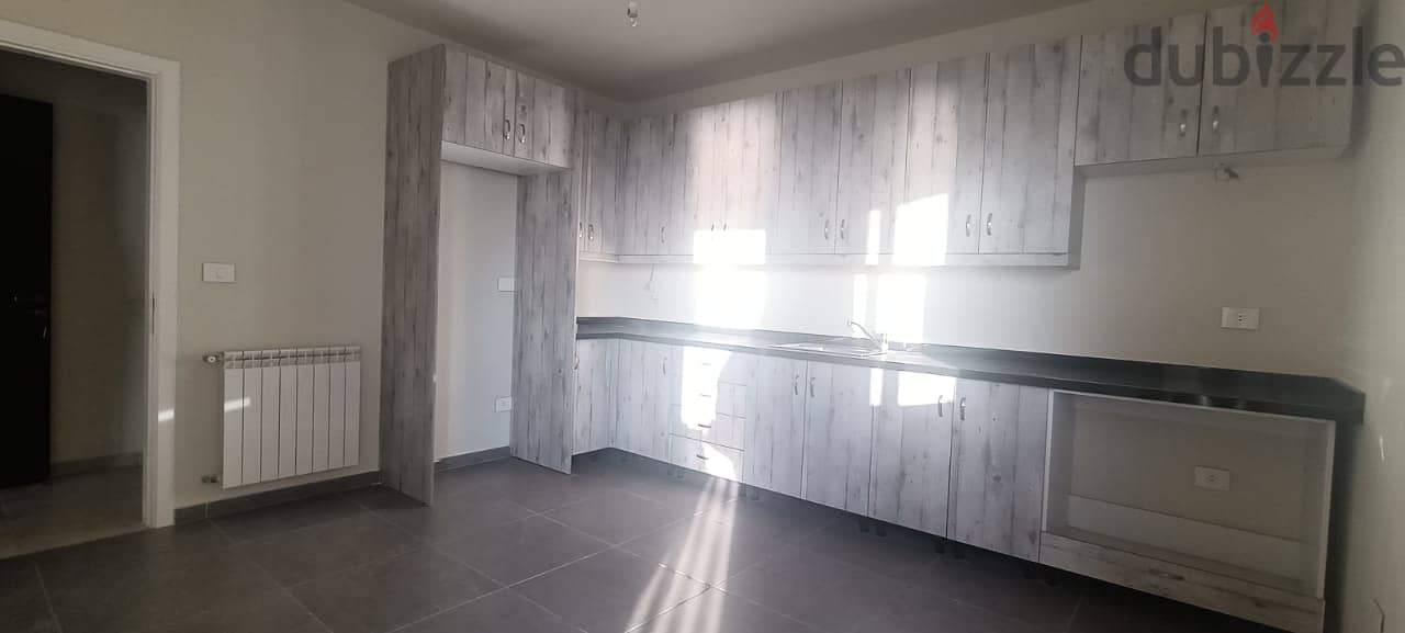 kfarhbab duplex with 100m terrace prime location near highway Ref#5879 5