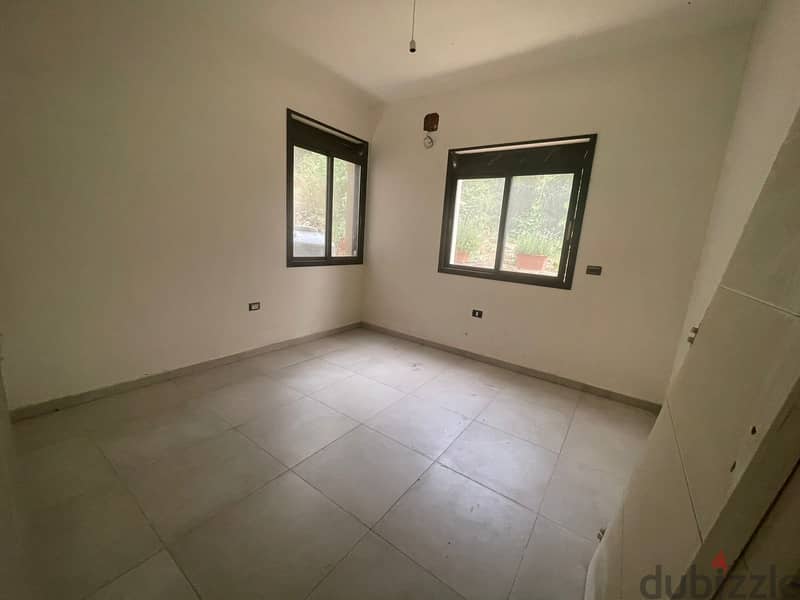 RWK130JS - Apartment For Sale in Ballouneh - شقة للبيع في بلونة 1
