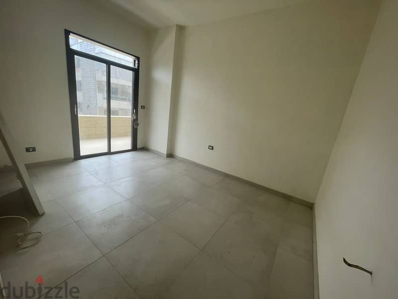 RWK130JS - Apartment For Sale in Ballouneh - شقة للبيع في بلونة 2