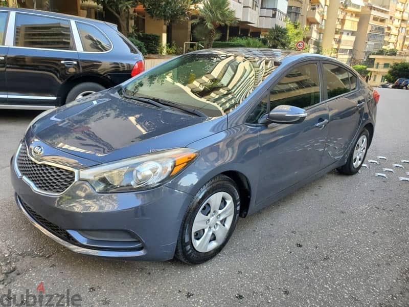 Kia forte 2016 very clean تبديل على grand cherokee or kia sportage 0