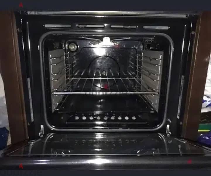 60cm Teka Gas-Electric Oven Stainless steal With its Wooden housing 1