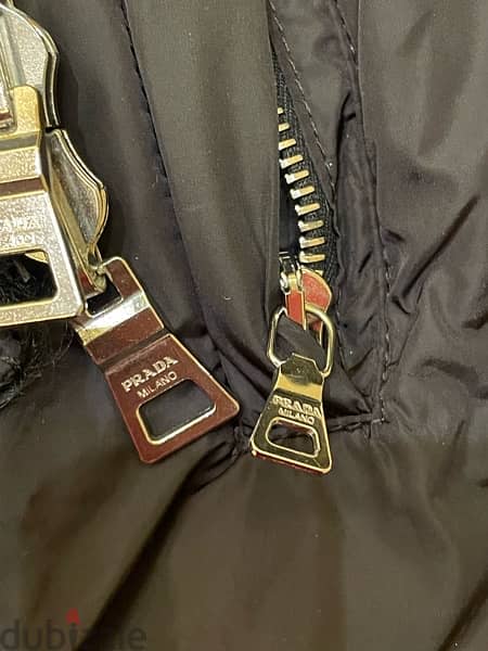 Prada discount zipper pull