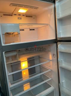 used silver fridge and freezer in good condition