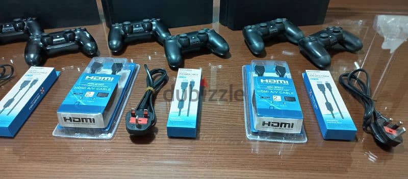 Playstation 4 European with 2 controller all cable and 20 games 7