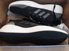 New unopened still in box with tag addidas unisex shoes