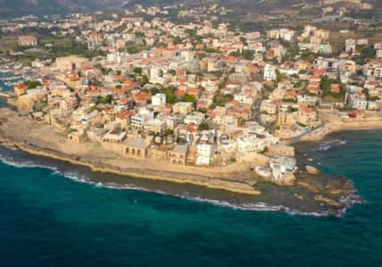 1000SQ LAND IN BATROUN TOWN SEA VIEW GOOD LOCATION