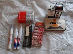 Staples, Tipex, paper clip, and stamp pad & ink