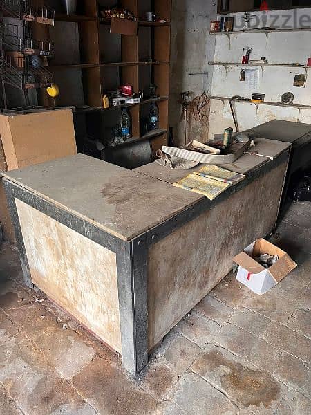 PLAIN WOOD SHELVES &  CARRARA MARBLE TABLE. 2