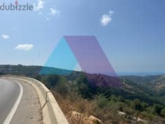 A 835 m2 land+open mountain view for sale in Haqel-أرض للبيع في حقل 0