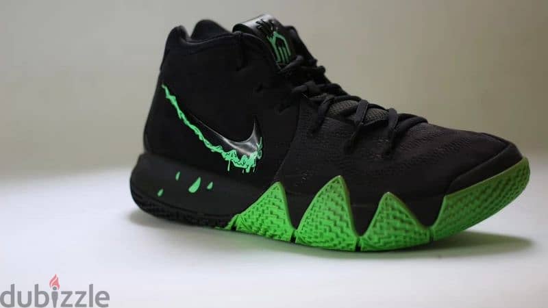 Kyrie irving black on sale and green shoes