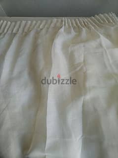 Two white curtains - Not Negotiable