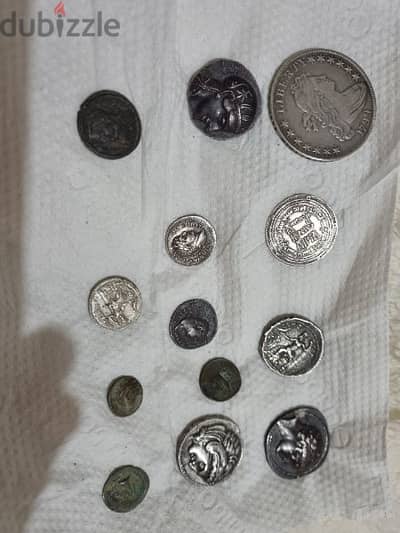 A silver collection of ancient  coins gram 7 dollars