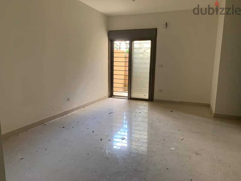 L14148-2-Bedroom Apartment With Garden for Sale In Mansourieh 1