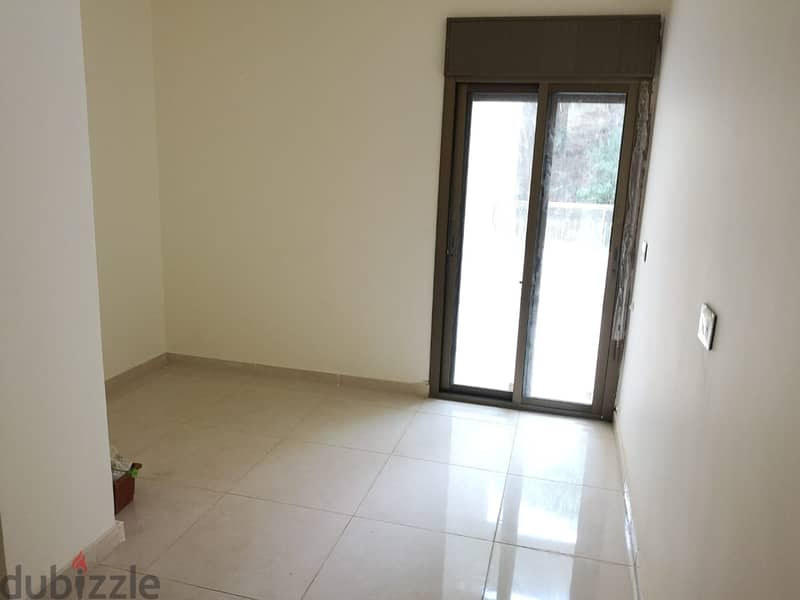 L07384-Apartment with 90 sqm Garden for Sale in Mar Roukoz 1