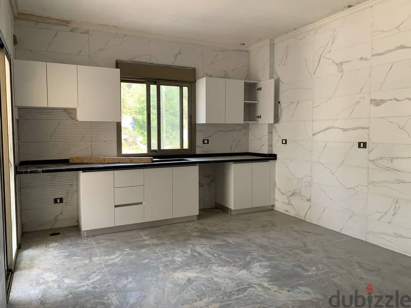 L14164-3-Bedroom Apartment With A Greenery View for Sale In Baabdat 1