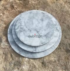 Set of footed marble serving trays