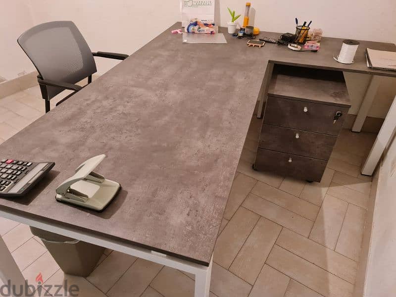 Office table including one chair. 1
