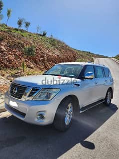Nissan Patrol LE fully loaded, silver exterior  and beige interior 0