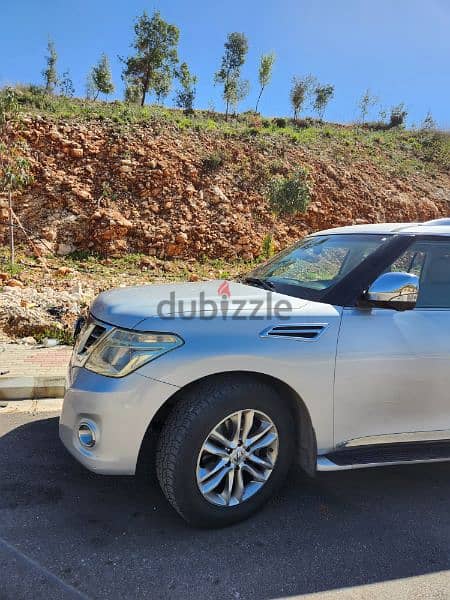 Nissan Patrol LE fully loaded, silver exterior  and beige interior 1