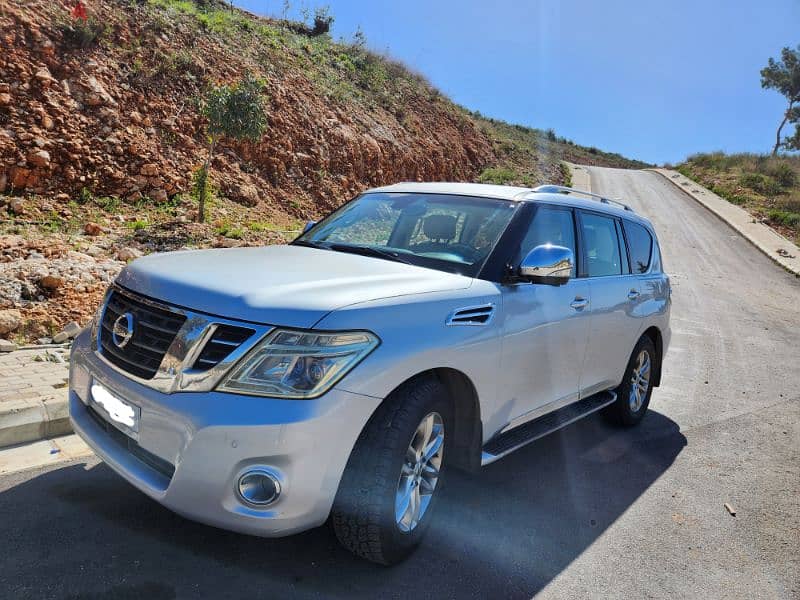 Nissan Patrol LE fully loaded, silver exterior  and beige interior 11