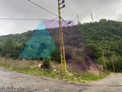 A 1030 m2 land+open mountain/sea view for sale in Zebdine 0