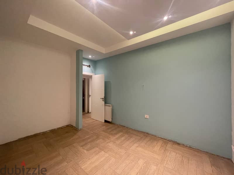 RWK224JS - Apartment For Sale In Ballouneh - شقة للبيع في بلونة 4