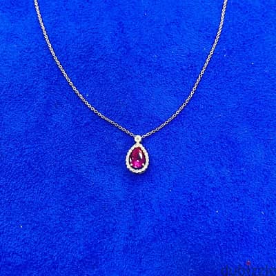 Yellow gold necklace with ruby