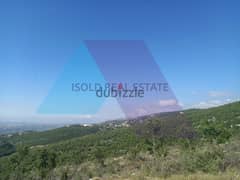 A 1800 m2 land having an open mountain view for sale in Assia/Batroun 0