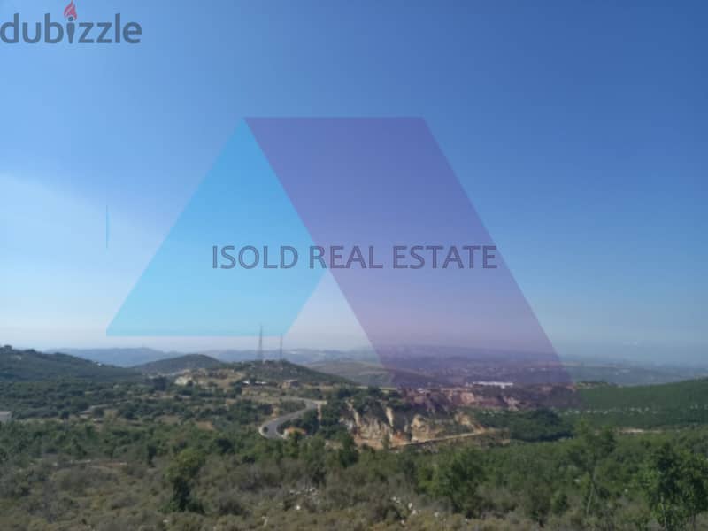 A 1800 m2 land having an open mountain view for sale in Assia/Batroun 4