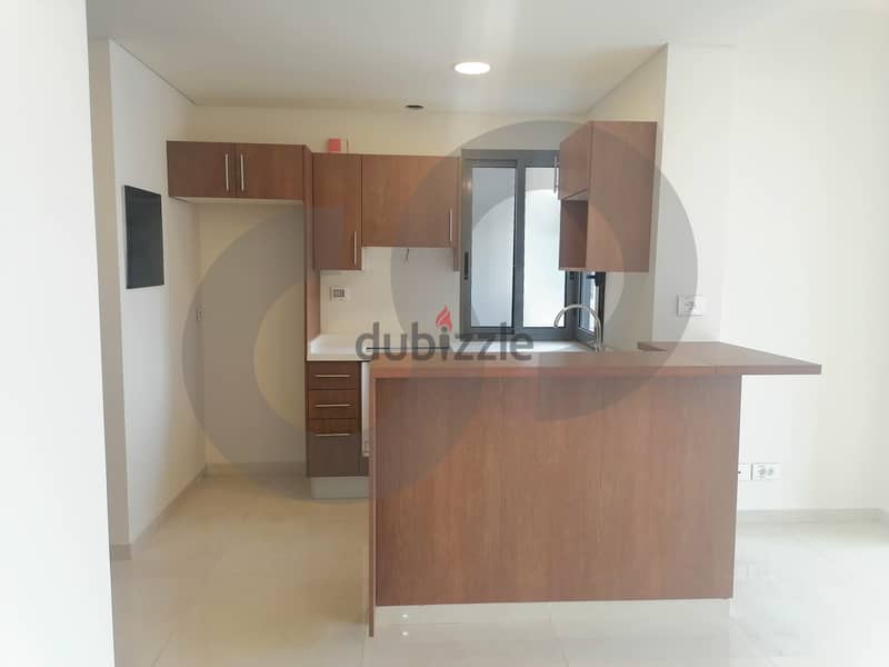 BRAND NEW APARTMENT WITH TERRACE IN ACHRAFIEH/اشرفيه REF#SI100264 2