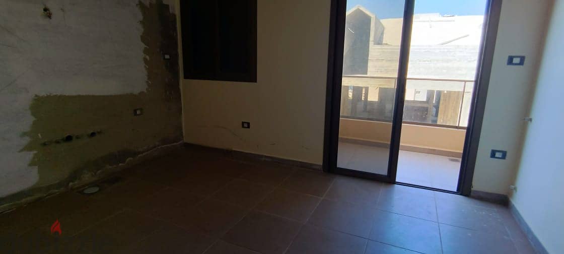 L12106-120 SQM Apartment With A Sea View for Sale In Bouar 1