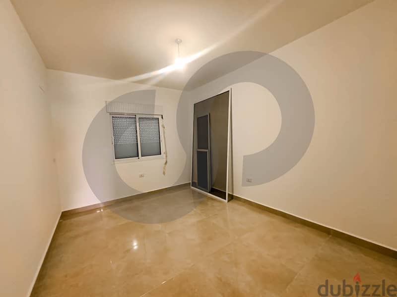A 120-square-meter apartment in KOURA/الكورة REF#TI100378 3