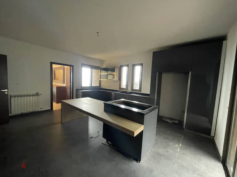 RWK159JS - Apartment For Sale in Ballouneh - شقة للبيع في بلونة 6